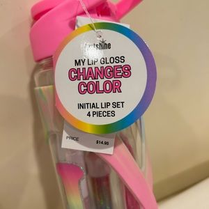 Justice tumbler “L” with lip balms. Brand new never opened